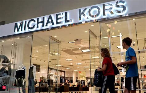 michael kors owns louis vuitton|Coach parent buys Versace and Michael Kors owner for $8.5 .